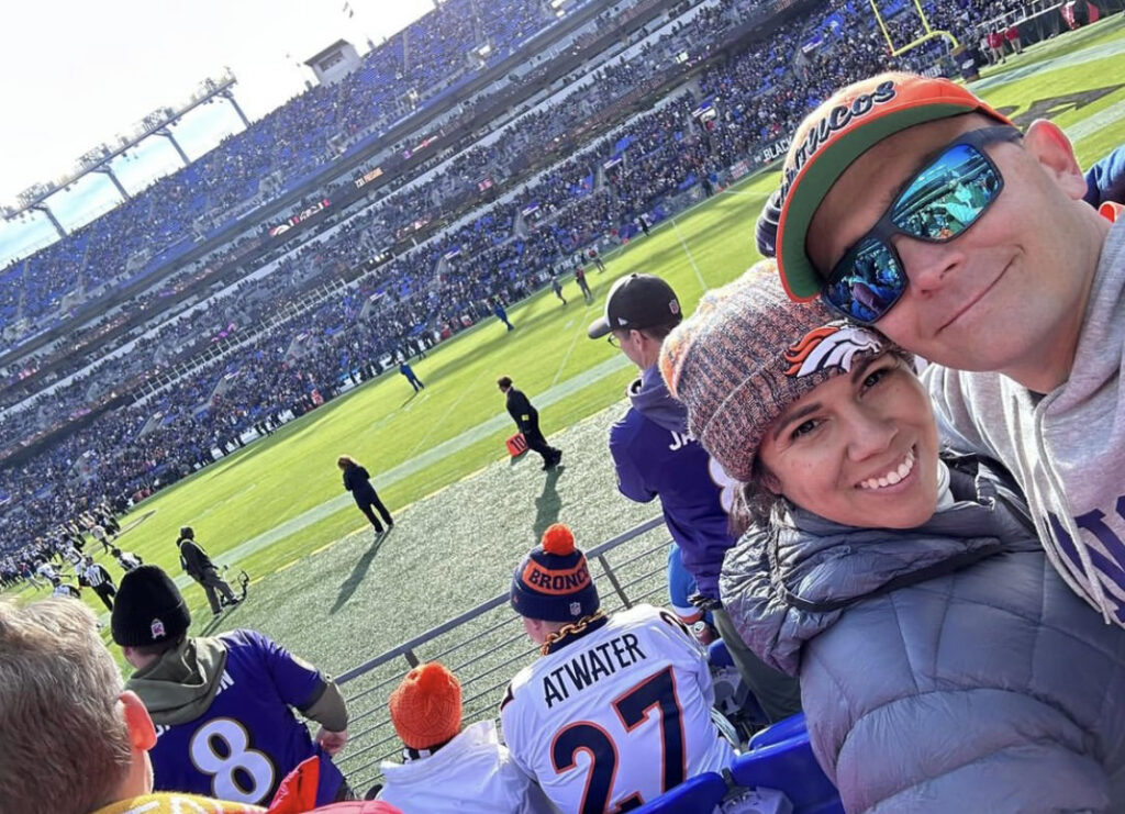 Miles and Trisha at a Denver Broncos game